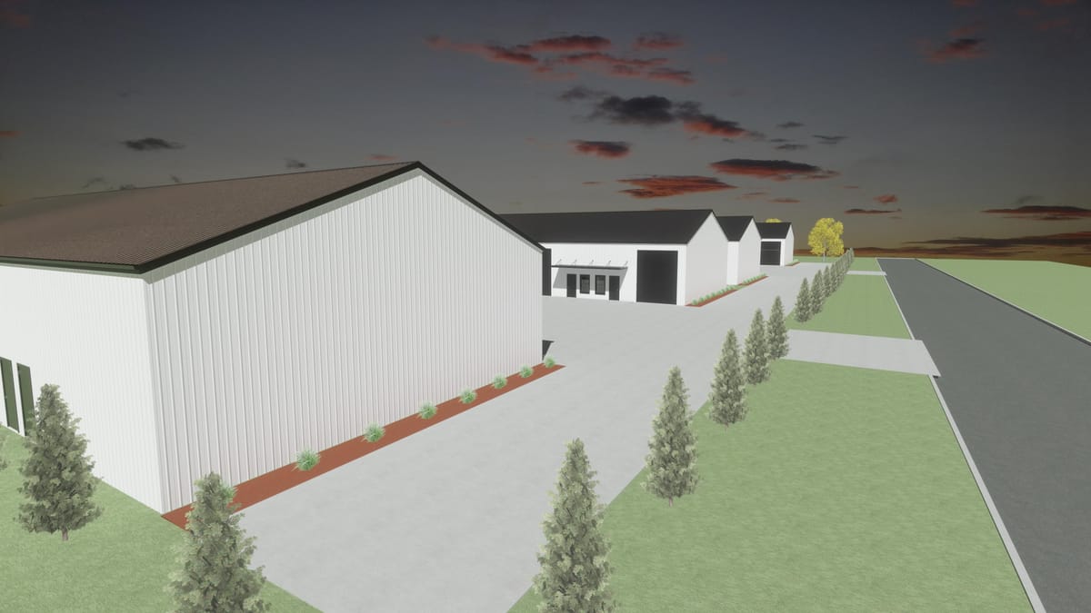 Architectural rendering of Gemstone Heights at dusk: two white metal buildings with dark roofs on a landscaped two-acre site